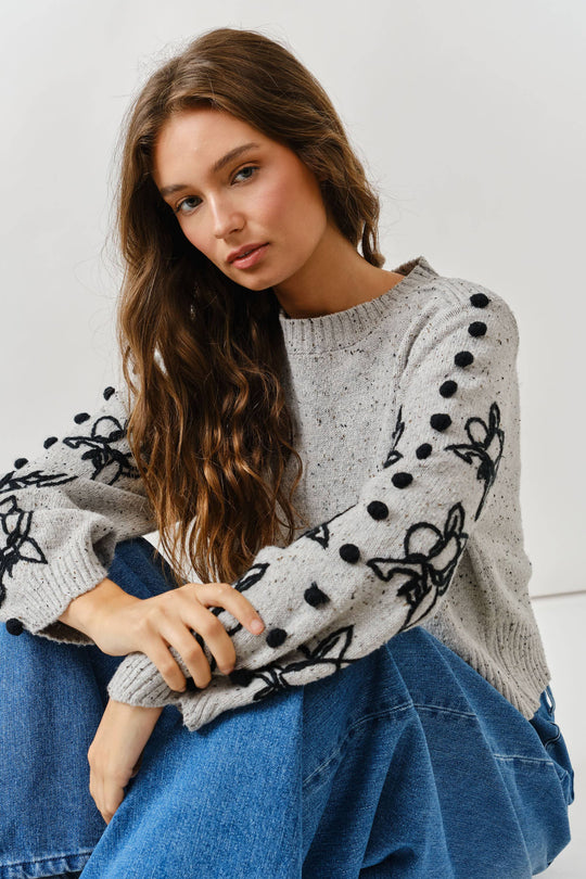 Floral Embroidered Sleeve Sweater with Pom Pom Detail