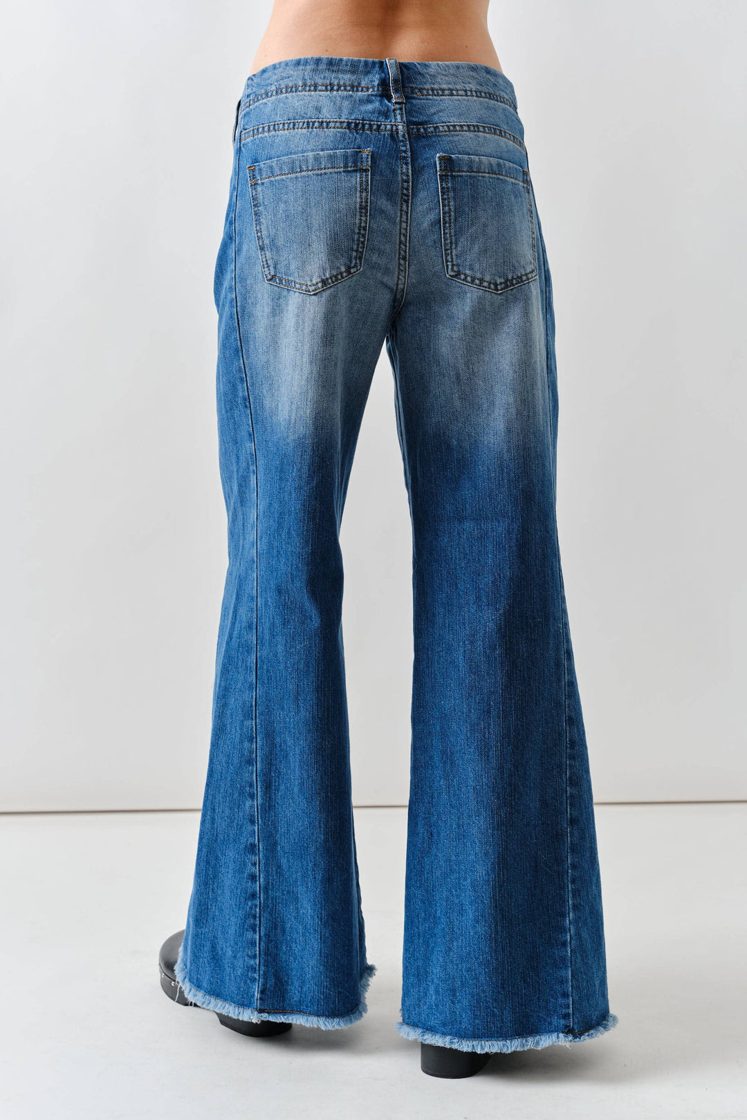 Super Flare Jeans With Frayed Bottom