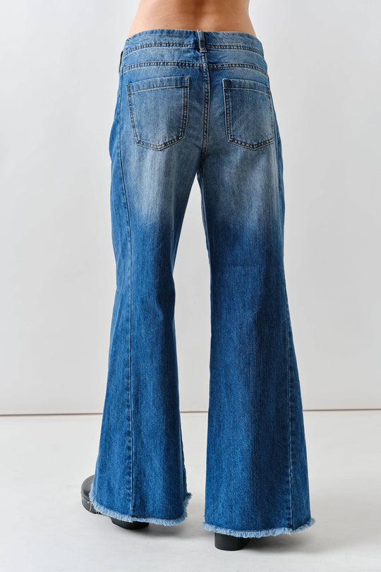 Super Flare Jeans With Frayed Bottom