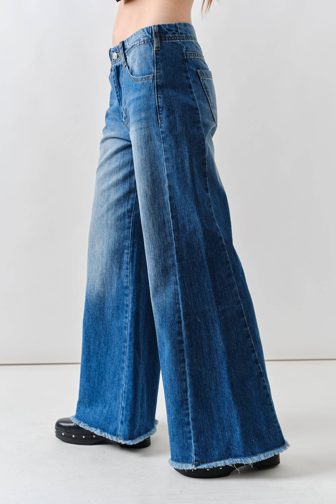 Super Flare Jeans With Frayed Bottom