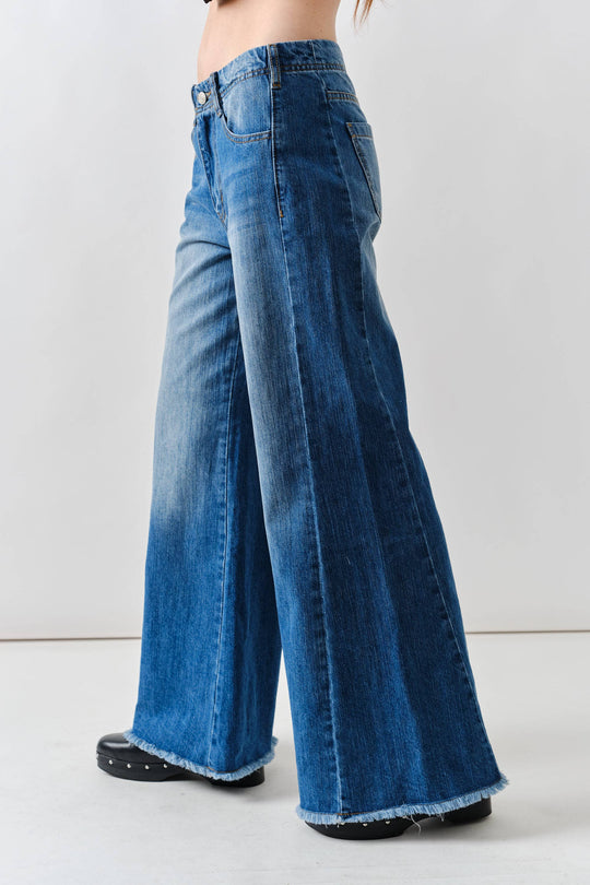 Super Flare Jeans With Frayed Bottom