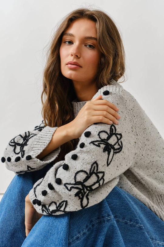 Floral Embroidered Sleeve Sweater with Pom Pom Detail