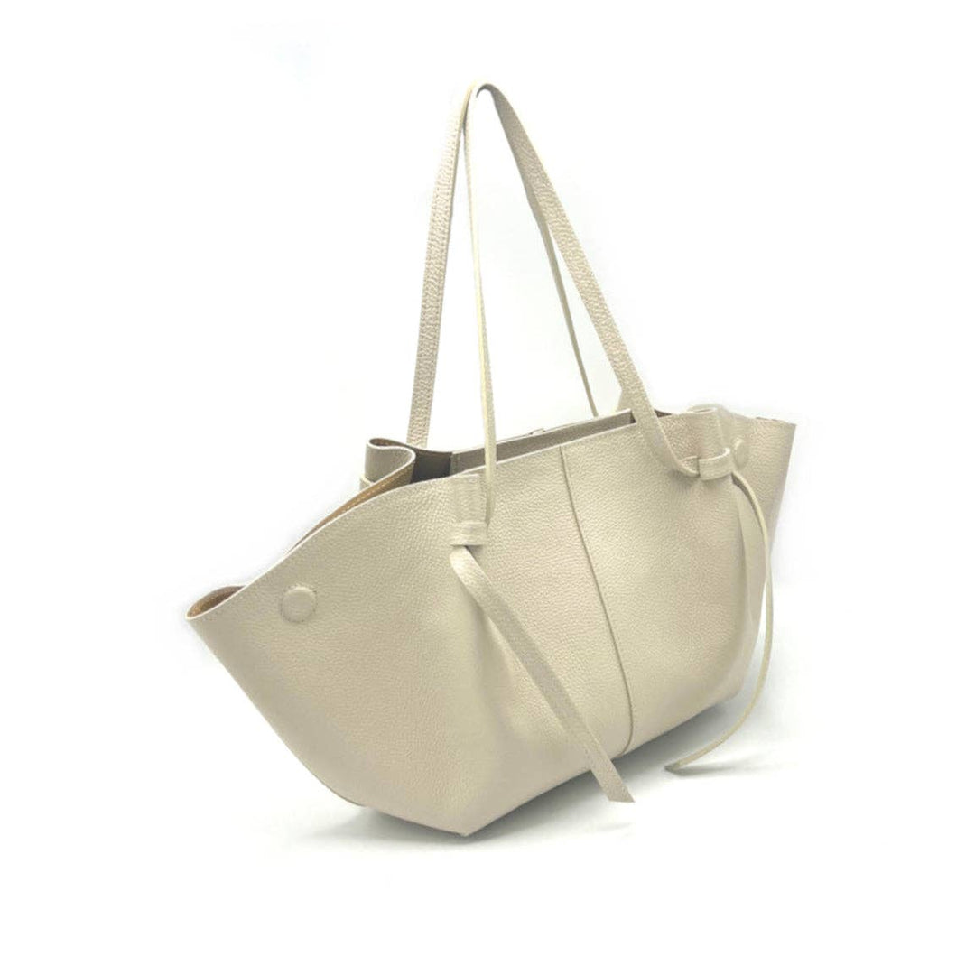 Beige tote bag with drawstring on a white background