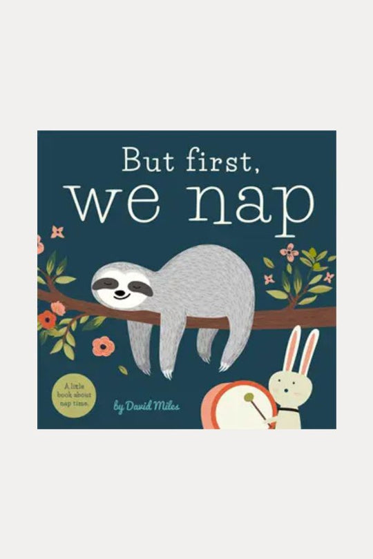 Book cover of 'But first, we nap' with a sloth and rabbit illustration on a blue background.
