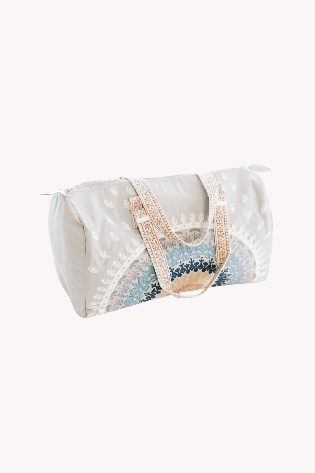 White duffel bag with floral pattern on a white background