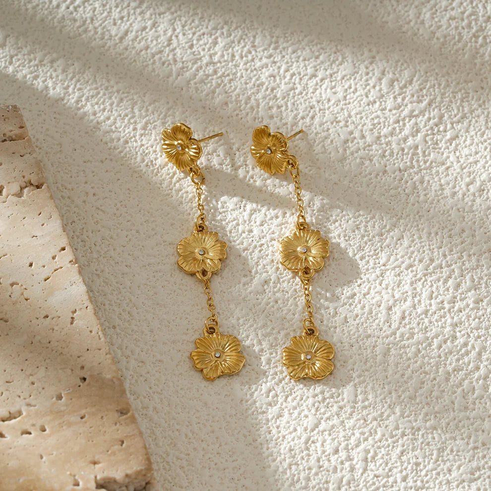 Gold Flower Dangle Earrings with Rhinestone Center
