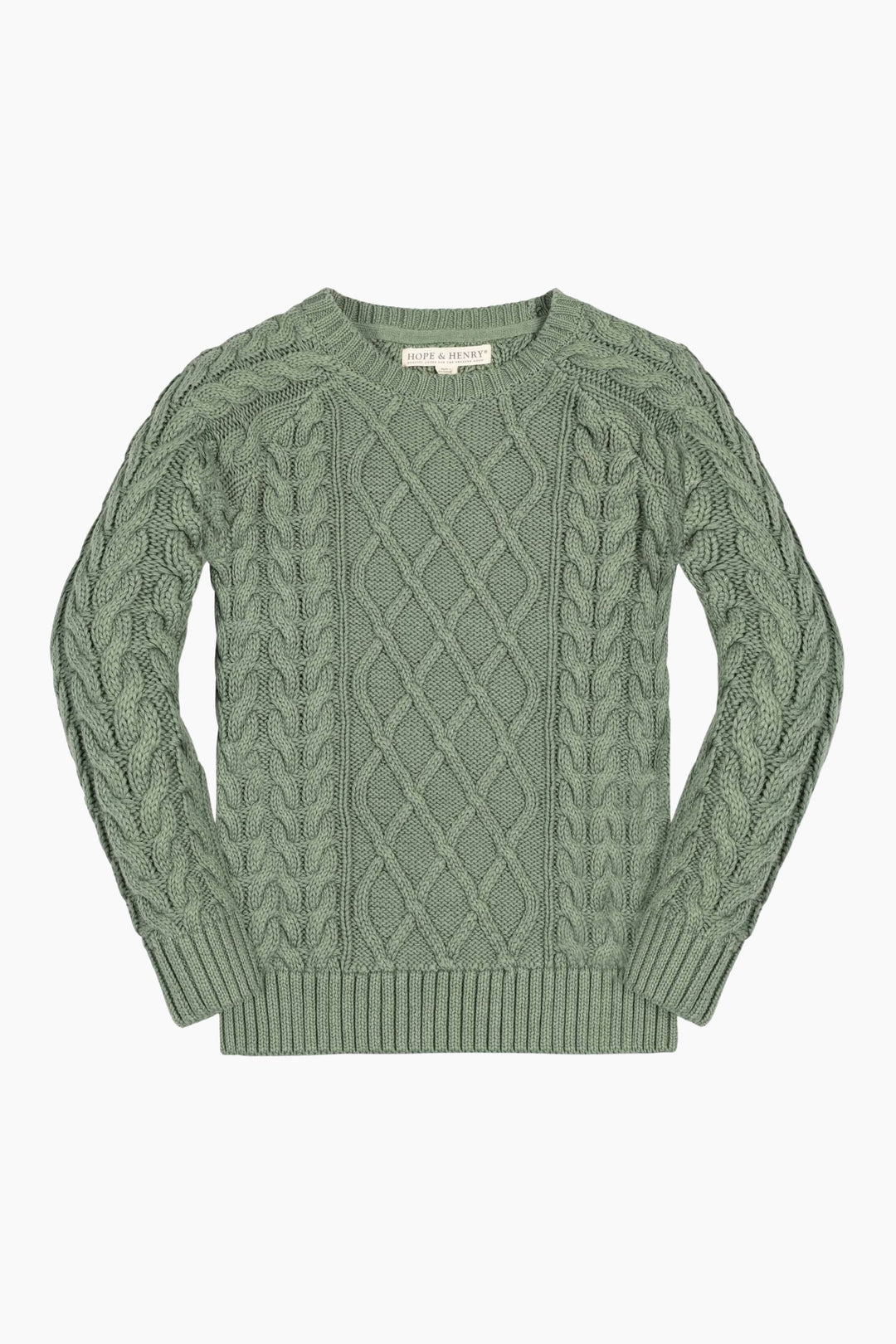 Green cable knit sweater on a white background