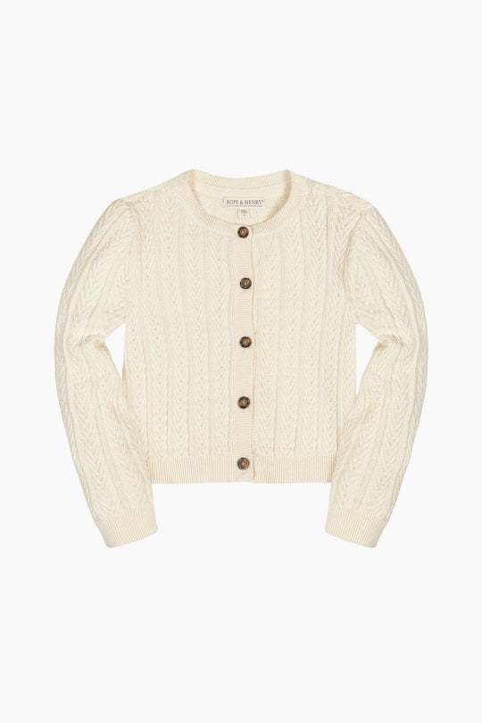 Cream-colored cardigan with brown buttons on a white background