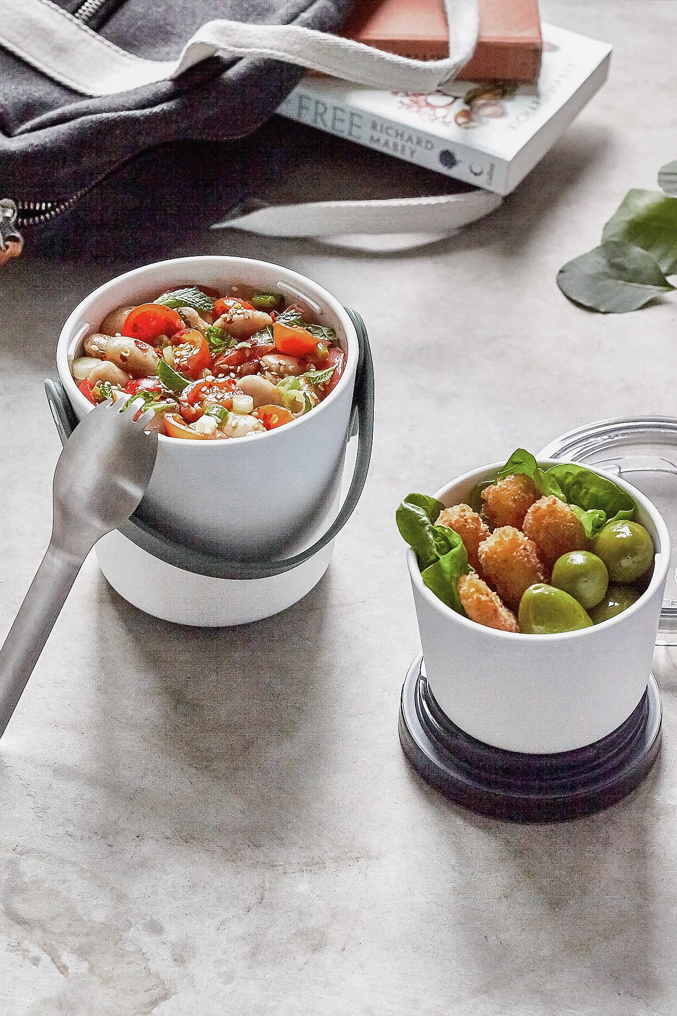 https://simplegoodgifts.com/cdn/shop/products/black-and-blum-original-lunch-pot-olive-set-of-2-lifestyle-2_1400x.jpg?v=1678314535